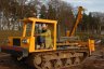  - David Millar at the controls of a tracked machine he adapted to suit a Bryce Suma Post Driver.  Alan and David Millar have three Bryce Sumas - one with a Rock Spike.